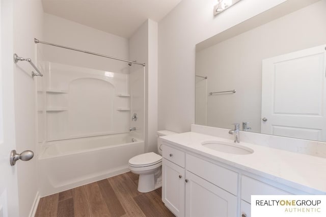 full bathroom featuring wood-type flooring, vanity, toilet, and shower / bathtub combination