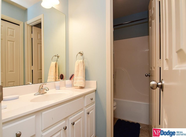 full bathroom with separate shower and tub, vanity, and toilet