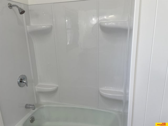 bathroom featuring washtub / shower combination