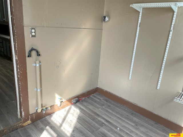 laundry room featuring hardwood / wood-style flooring