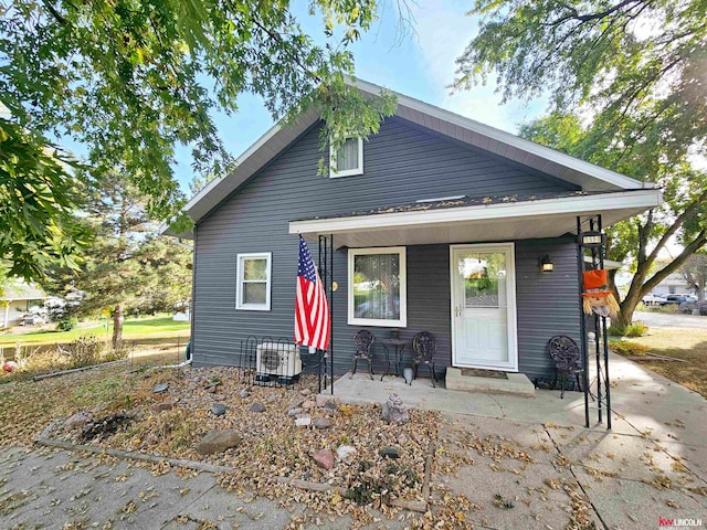 view of front of property featuring cooling unit