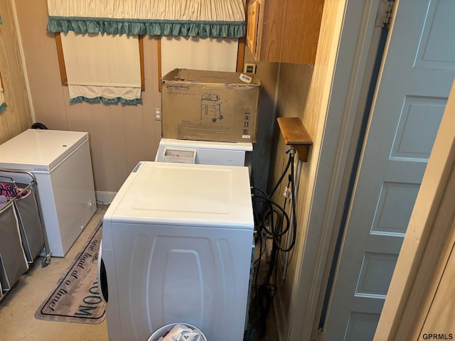 laundry area featuring cabinets and washer and dryer