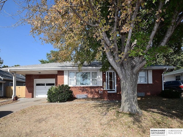 single story home with a garage