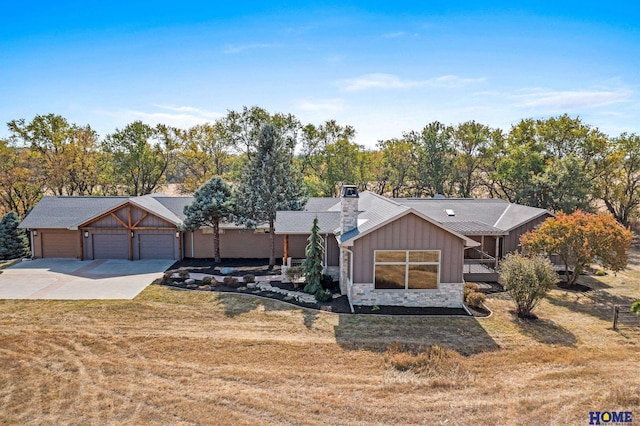 ranch-style house with a front lawn and a garage