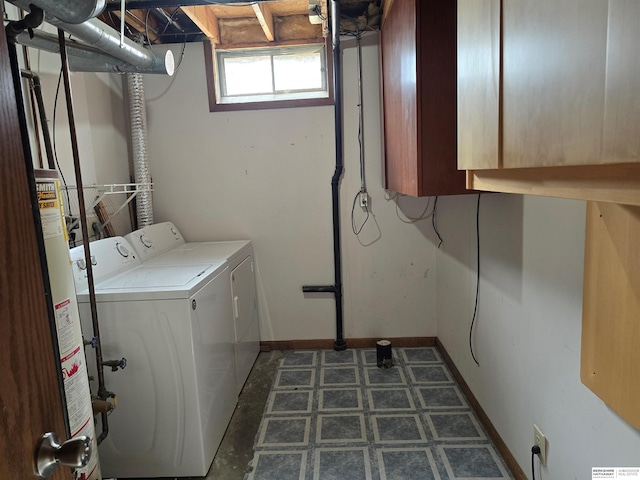 clothes washing area with washer and dryer