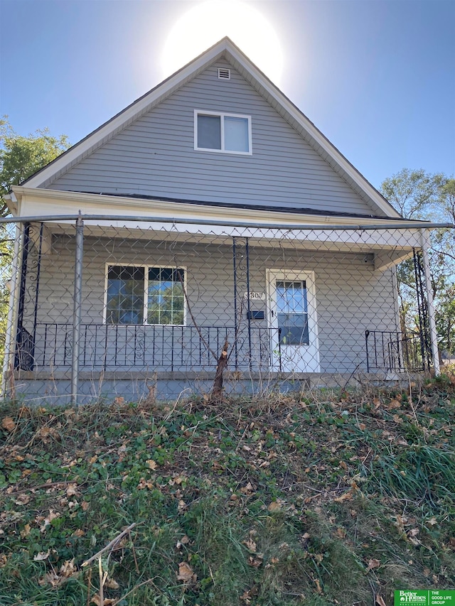 view of home's exterior featuring a porch