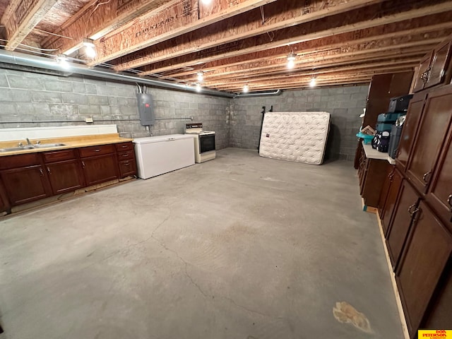 basement with sink, electric panel, and fridge