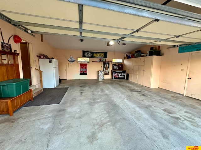 garage with white fridge