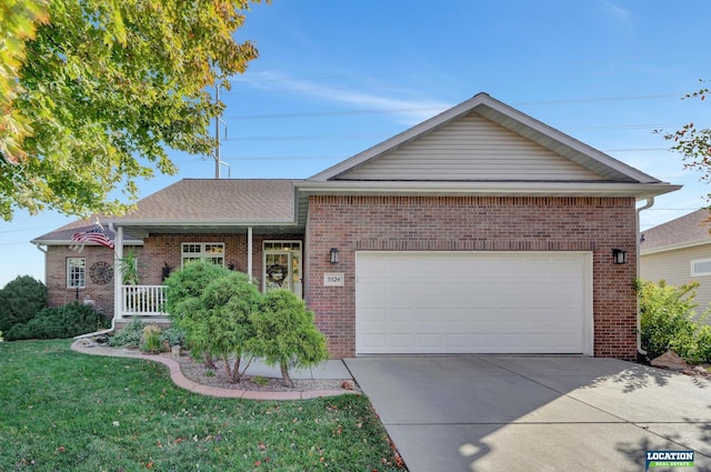 ranch-style house featuring covered porch, a front yard, and a garage