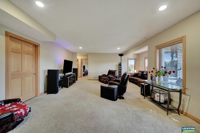 living room with light colored carpet