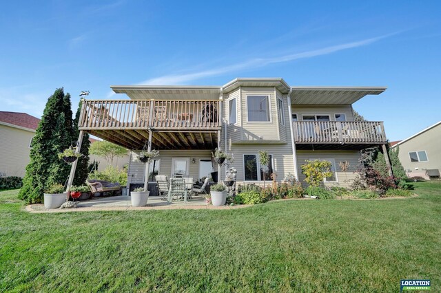 back of house with a yard and a patio area