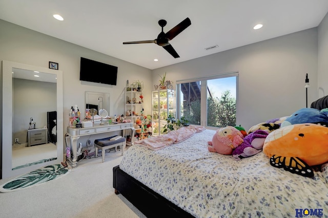 bedroom with ceiling fan and carpet flooring