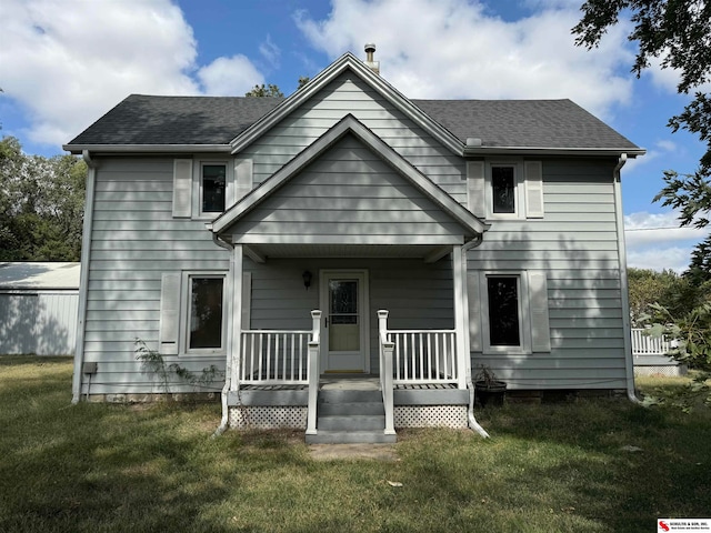 view of front facade featuring a front yard and a porch