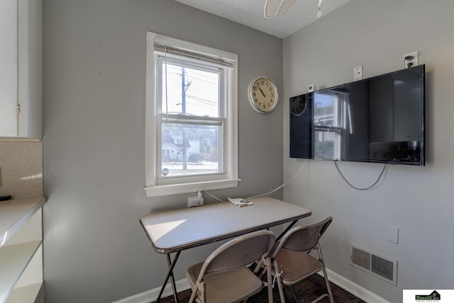 office space with hardwood / wood-style floors