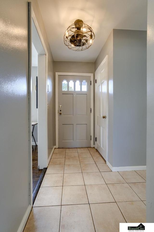 doorway featuring light tile patterned floors