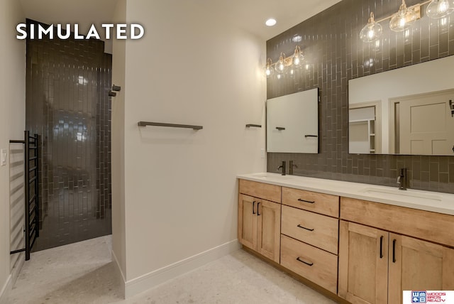 bathroom featuring vanity, a shower, and tasteful backsplash