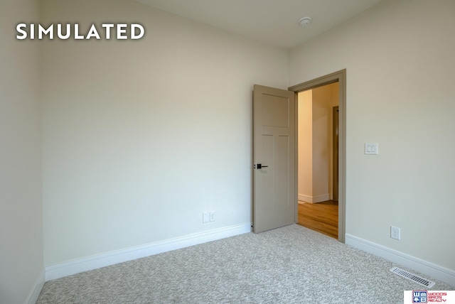 view of carpeted spare room