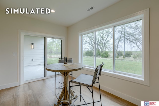 dining room featuring light hardwood / wood-style floors