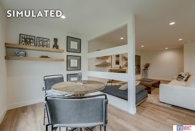 dining room featuring light hardwood / wood-style flooring