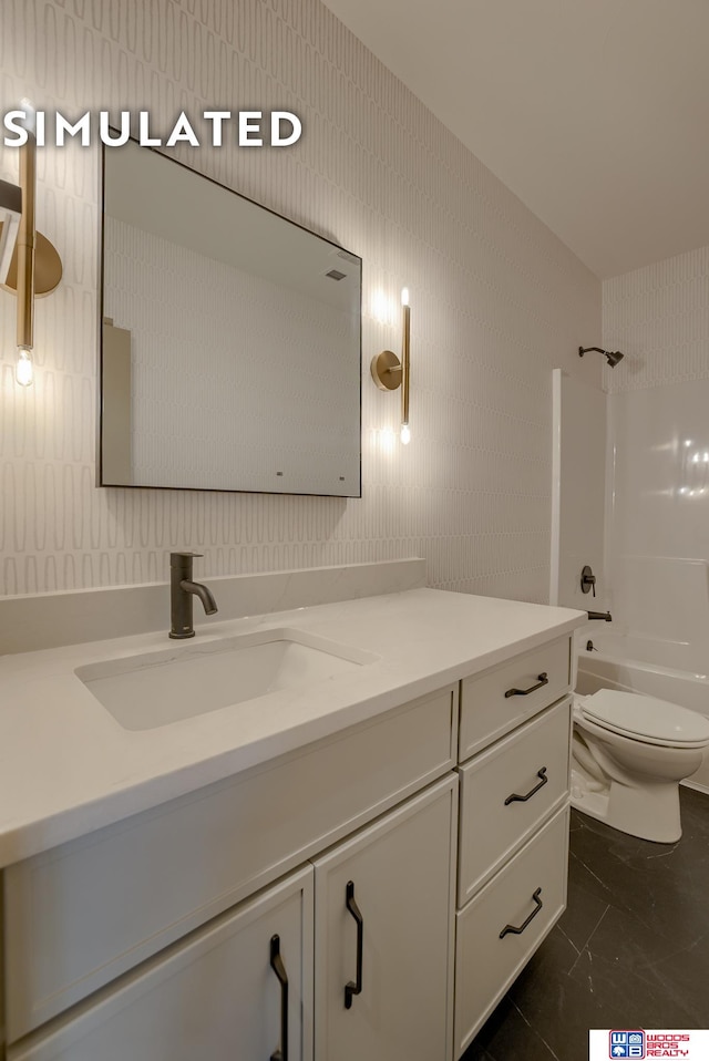 full bathroom with vanity, shower / tub combination, and toilet