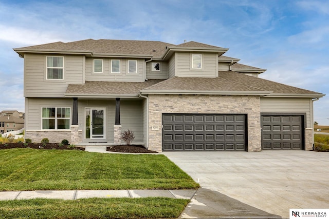 prairie-style home featuring a front yard