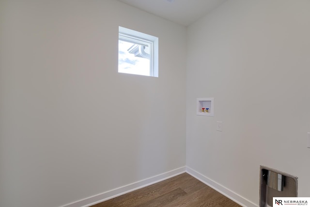 clothes washing area with washer hookup and dark hardwood / wood-style flooring