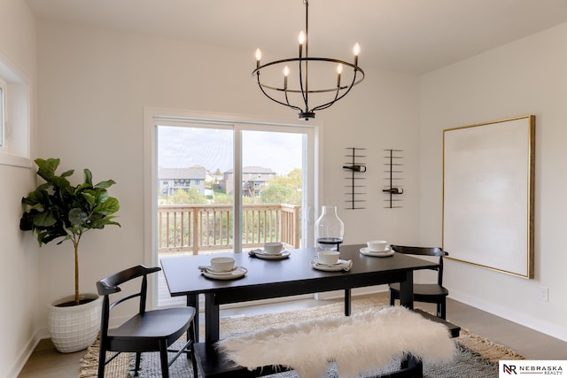 dining area featuring a chandelier