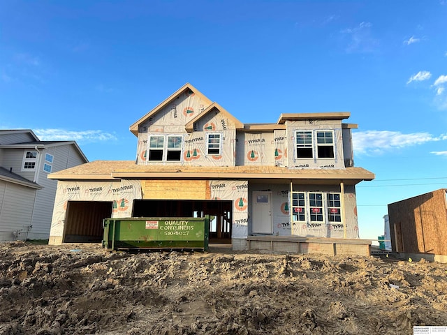 property in mid-construction with a garage