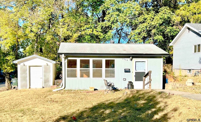 view of outdoor structure featuring a yard