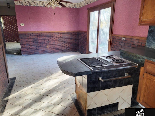 kitchen featuring ceiling fan