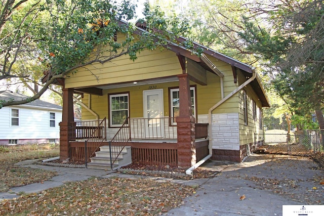 bungalow featuring covered porch