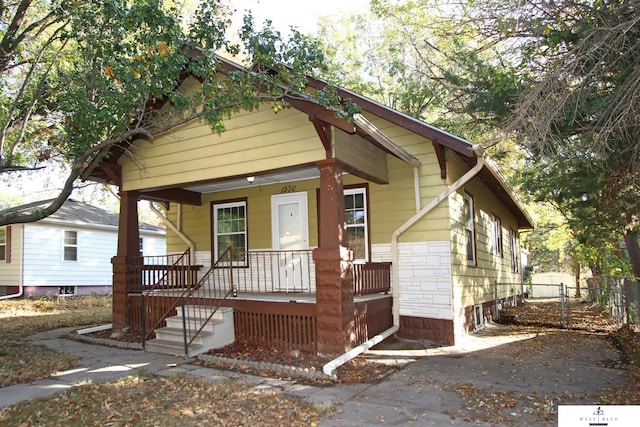 bungalow featuring covered porch