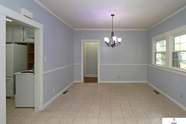 unfurnished dining area with ornamental molding, an inviting chandelier, and light tile patterned floors