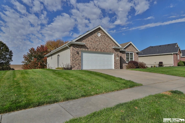 view of front of property with a garage and a front lawn