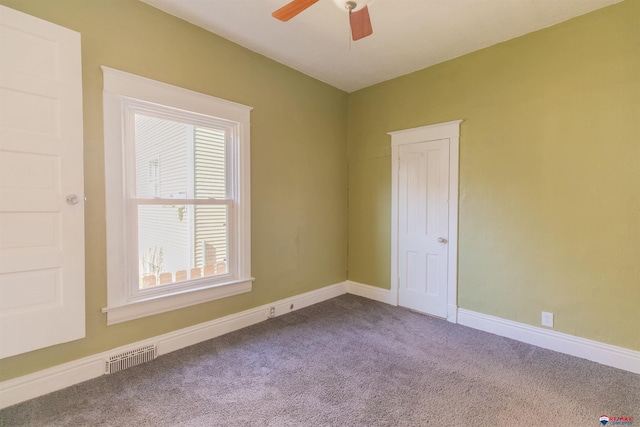 unfurnished room with carpet floors and ceiling fan