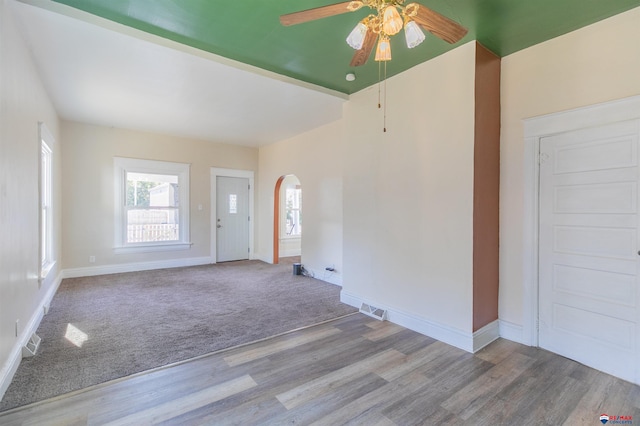 unfurnished room featuring light hardwood / wood-style floors and ceiling fan