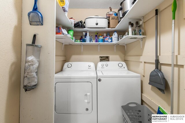 laundry room with washer and clothes dryer