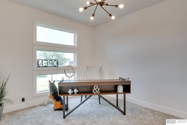 office space featuring light carpet and a notable chandelier