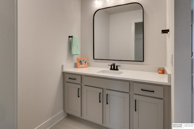 bathroom with vanity and tile patterned floors