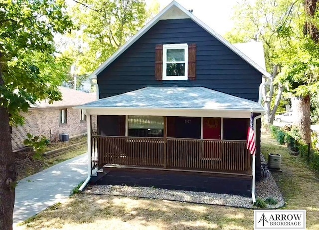 rear view of house with a porch