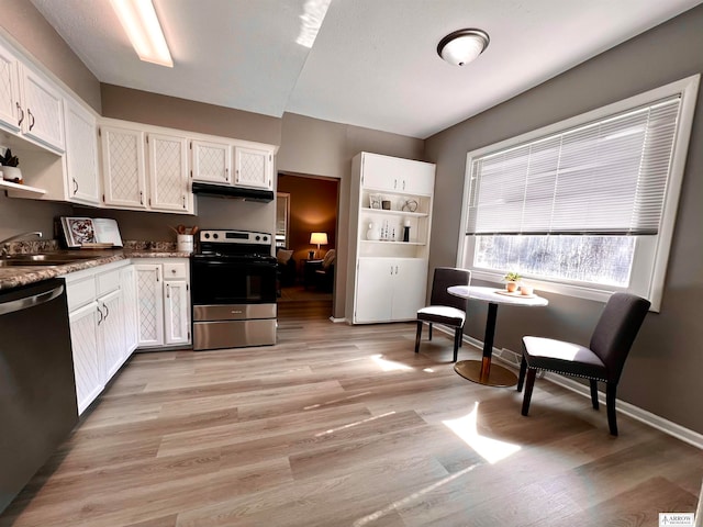 kitchen with sink, white cabinets, stainless steel appliances, and light hardwood / wood-style floors