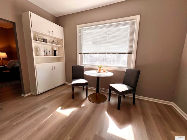 sitting room with light hardwood / wood-style floors