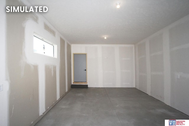 basement with a textured ceiling