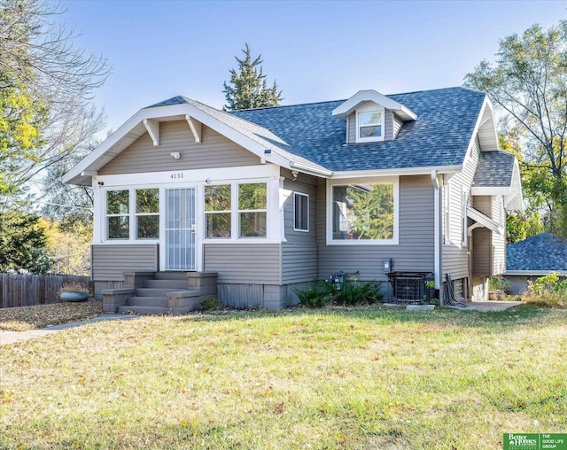 view of front of home with a front yard