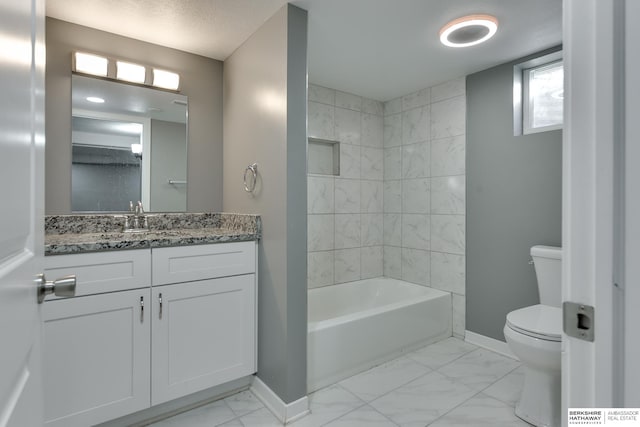 full bathroom with toilet, vanity, and shower / bathtub combination