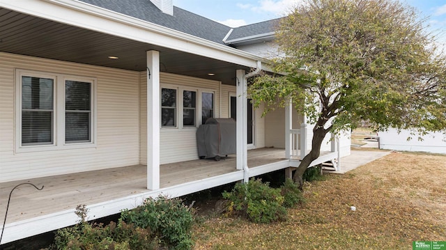 wooden deck featuring area for grilling