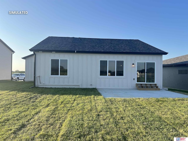 back of house featuring a yard and a patio