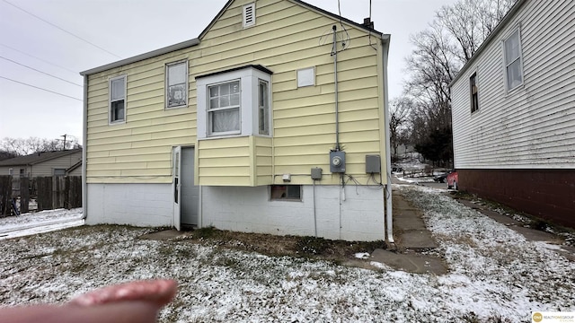 view of snow covered property