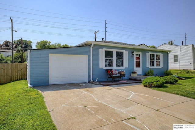 7336 S 71st Ave, Omaha, NE 68128 - view of front of house featuring driveway