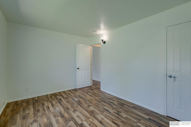 7336 S 71st Ave, Omaha, NE 68128 - spare room with wood finished floors and baseboards